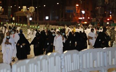 Muslim pilgrims arrive to circumambulate around the Kaaba, Islam's holiest shrine, at the Grand mosque in the holy Saudi city of Mecca during the annual hajj pilgrimage, on July 17, 2021 (Fayez Nureldine / AFP)