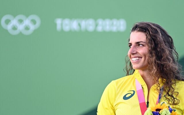 Australia's Jessica Fox poses with her bronze medal on the podium following the women's Kayak final during the Tokyo 2020 Olympic Games at Kasai Canoe Slalom Centre in Tokyo, on July 27, 2021. (Charly Triballeau/AFP)