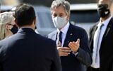 US Secretary of State Antony Blinken (C) speaks with officials before he boards his plane on his return to the United States from Kuwait International Airport in Kuwait City, on July 29, 2021. (Jonathan Ernst/Pool/ AFP)