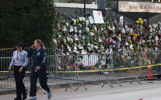 Flowers and other items fill a memorial put up for those lost in the partially collapsed 12-story Champlain Towers South condo building on July 01, 2021 in Surfside, Florida (JOE RAEDLE / GETTY IMAGES NORTH AMERICA / Getty Images via AFP) Flowers and other items fill a memorial put up for those lost in the partially collapsed 12-story Champlain Towers South condo building on July 01, 2021 in Surfside, Florida (JOE RAEDLE / GETTY IMAGES NORTH AMERICA / Getty Images via AFP)