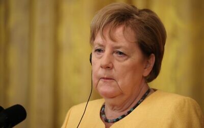 German Chancellor Angela Merkel listens during a joint news conference with US President Joe Biden in the East Room of the White House on July 15, 2021 in Washington, DC. (Photo by CHIP SOMODEVILLA / GETTY IMAGES NORTH AMERICA / Getty Images via AFP)
