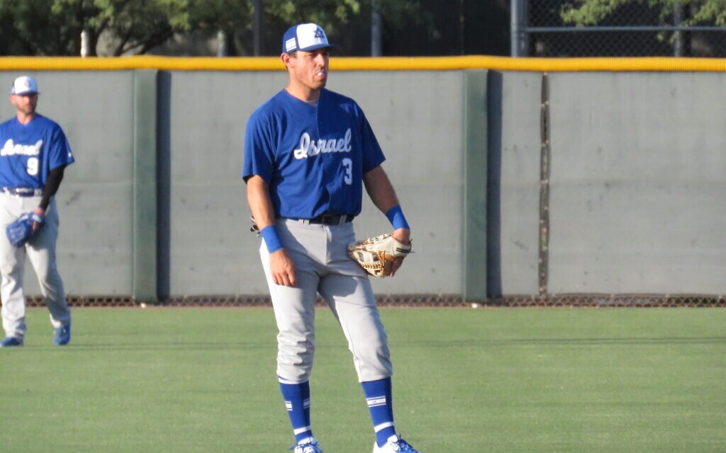 Team Israel's Ian Kinsler blows a bubble while playing second base during an exhibition game in Arizona. (Courtesy of Israel Baseball/ via JTA)