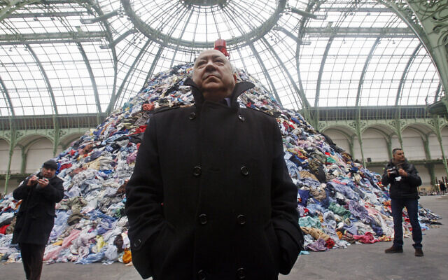 French artist Christian Boltanski stands next to his installation 'Persones' during the Monumenta 2010 exhibition at the Grand Palais in Paris, January 12, 2010.(AP Photo/Michel Euler)