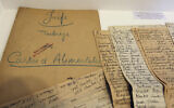 Illustrative: In this photo taken on July 16, 2012 documents coming from the Archives of Paris Police Prefecture and showing lists of Jewish people registered during WWII, are presented for an exhibition of French archives on Shoah in Paris. (AP/Remy de la Mauviniere)