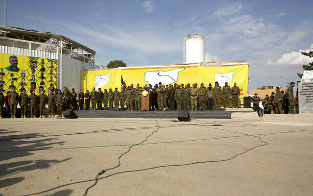 Illustrative: US-backed Syrian Democratic Forces (SDF) speak at a ceremony to mark their defeat of Islamic State militants in Baghouz, at al-Omar Oil Field base, Syria, March 23, 2019. (AP Photo/Maya Alleruzzo) Illustrative: US-backed Syrian Democratic Forces (SDF) speak at a ceremony to mark their defeat of Islamic State militants in Baghouz, at al-Omar Oil Field base, Syria, March 23, 2019. (AP Photo/Maya Alleruzzo)