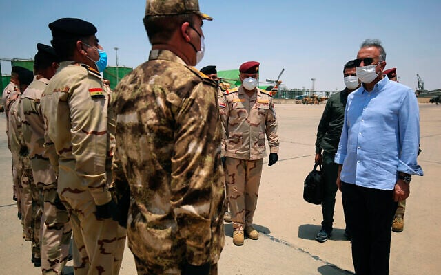 Iraq's Prime Minister Mustafa al-Kadhimi, right, arrives in Basra, Iraq, July 15, 2020. (Ahmed al-Rubaye/Pool Photo via AP) Iraq's Prime Minister Mustafa al-Kadhimi, right, arrives in Basra, Iraq, July 15, 2020. (Ahmed al-Rubaye/Pool Photo via AP)