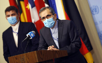 Iran's UN Ambassador Majid Takht Ravanchi speaks to reporters following a meeting with members of the UN Security Council, August 20, 2020, at the United Nations. (Mike Segar/Pool via AP) Iran's UN Ambassador Majid Takht Ravanchi speaks to reporters following a meeting with members of the UN Security Council, August 20, 2020, at the United Nations. (Mike Segar/Pool via AP)