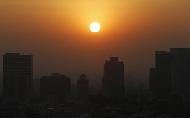The sun rises amid smog during the dry season in Mexico City, February 20, 2020. (AP Photo/Marco Ugarte) The sun rises amid smog during the dry season in Mexico City, February 20, 2020. (AP Photo/Marco Ugarte)