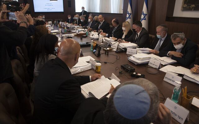 Prime Minister Naftali Bennett chairs the weekly cabinet meeting in Jerusalem, June 27, 2021. (AP Photo/Maya Alleruzzo, Pool) Prime Minister Naftali Bennett chairs the weekly cabinet meeting in Jerusalem, June 27, 2021. (AP Photo/Maya Alleruzzo, Pool)