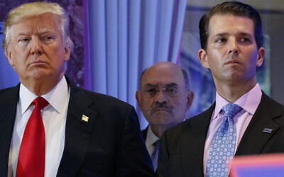 President-elect Donald Trump, left, his chief financial officer Allen Weisselberg, center, and his son Donald Trump Jr., right, during a news conference at Trump Tower in New York, January 11, 2017. (AP Photo/Evan Vucci, File)