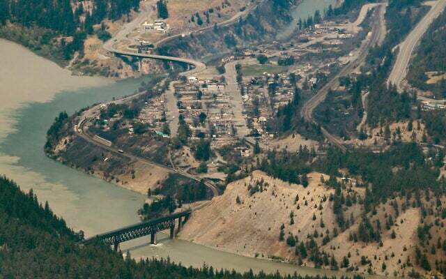 In this aerial photo taken from a helicopter, structures destroyed by a wildfire are seen in Lytton, British Columbia, on July 1, 2021. (Darryl Dyck/The Canadian Press via AP) In this aerial photo taken from a helicopter, structures destroyed by a wildfire are seen in Lytton, British Columbia, on July 1, 2021. (Darryl Dyck/The Canadian Press via AP)