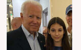 In this photo provided by a family member, 12-year-old Elisheva Cohen poses with President Joe Biden, Thursday, July 1, 2021, in Surfside, Fla., as the president and first lady visited the community devastated by the fatal collapse of the 12-story Champlain Towers South beachfront condominium a week earlier. (Contributed Photo via AP)