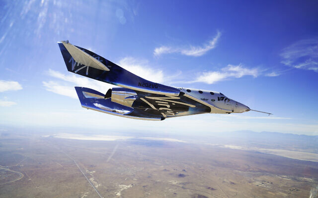This May 29, 2018, photo made available by Virgin Galactic shows the company's VSS Unity on its second supersonic flight. (Virgin Galactic via AP) This May 29, 2018, photo made available by Virgin Galactic shows the company's VSS Unity on its second supersonic flight. (Virgin Galactic via AP)