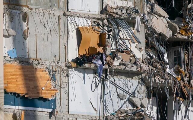 Personal belongings dangle from inside the partially collapsed Champlain Towers South Condo building in Surfside, Florida, July 3, 2021. (Matias J. Ocner/Miami Herald via AP) Personal belongings dangle from inside the partially collapsed Champlain Towers South Condo building in Surfside, Florida, July 3, 2021. (Matias J. Ocner/Miami Herald via AP)