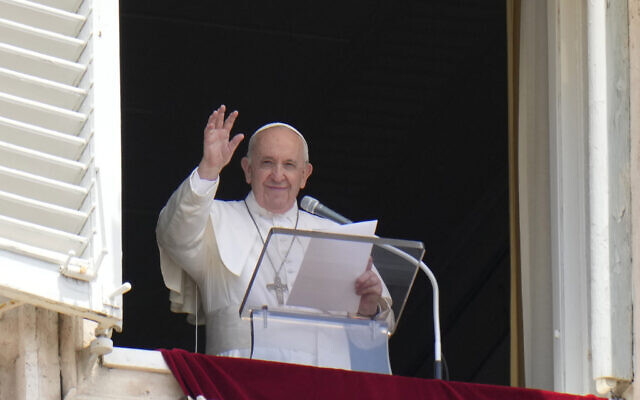 Pope Francis waves to the crowd as he arrives to recite the Angelus noon prayer from the window of his studio overlooking St. Peter's Square, at the Vatican on July 4, 2021. (AP Photo/Alessandra Tarantino) Pope Francis waves to the crowd as he arrives to recite the Angelus noon prayer from the window of his studio overlooking St. Peter's Square, at the Vatican on July 4, 2021. (AP Photo/Alessandra Tarantino)