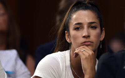Olympic gold medalist Aly Raisman listens to testimony during a US Senate Commerce subcommittee hearing in Washington, July 24, 2018. (AP Photo/Susan Walsh, File)