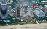 Illustrative: Rescue personnel work in the rubble at the Champlain Towers South Condo, in Surfside, Florida, June 25, 2021. (Gerald Herbert/AP)