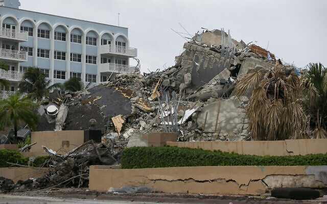 Rubble and debris of the Champlain Towers South condo can be seen Tuesday, July 6, 2021 in Surfside, Florida (Carl Juste/Miami Herald via AP) Rubble and debris of the Champlain Towers South condo can be seen Tuesday, July 6, 2021 in Surfside, Florida (Carl Juste/Miami Herald via AP)