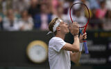 Canada's Denis Shapovalov reacts during the men's singles quarterfinals match against Russia's Karen Khachanov on day nine of the Wimbledon Tennis Championships in London, July 7, 2021. (AP Photo/Alastair Grant)