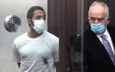 Khaled Awad, left, appears in Brighton District Court in Boston on July 8, 2021, for a dangerousness hearing. Awad has been charged with stabbing Rabbi Shlomo Noginski several times near a Jewish day school. (AP Photo/Elise Amendola, Pool)