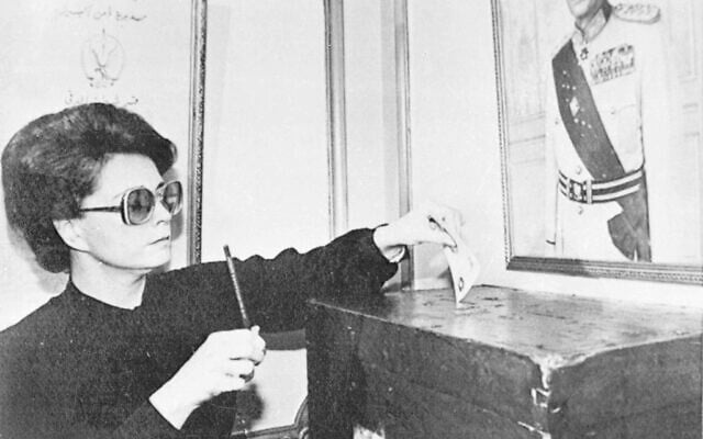 In this Oct. 18, 1981, photo, Jehan Sadat, widow of slain Egyptian President Anwar Sadat votes near her home in Giza at a local police station in a referendum to endorse Hosni Mubarak as her husband's successor. (AP Photo/Bill Foley, File) In this Oct. 18, 1981, photo, Jehan Sadat, widow of slain Egyptian President Anwar Sadat votes near her home in Giza at a local police station in a referendum to endorse Hosni Mubarak as her husband's successor. (AP Photo/Bill Foley, File)