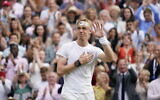 Canada's Denis Shapovalov acknowledges the crowd after being defeated by Serbia's Novak Djokovic during the men's singles semifinals match on day eleven of the Wimbledon Tennis Championships in London, July 9, 2021. (AP Photo/Alberto Pezzali)
