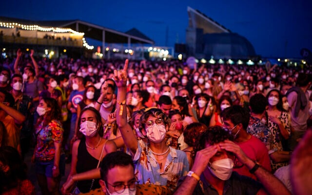 People attend the Cruilla music festival in Barcelona, Spain, July 9, 2021. (AP Photo/Joan Mateu) People attend the Cruilla music festival in Barcelona, Spain, July 9, 2021. (AP Photo/Joan Mateu)
