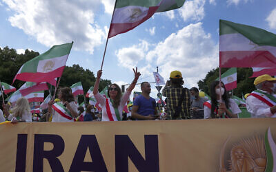 People attend a protest rally as part of the 'Free Iran World Summit 2021' in Berlin, Germany, July 10, 2021 (Michael Sohn/AP) People attend a protest rally as part of the 'Free Iran World Summit 2021' in Berlin, Germany, July 10, 2021 (Michael Sohn/AP)