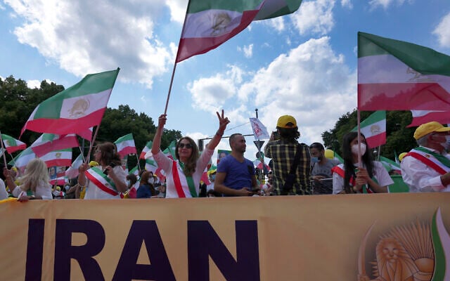 People attend a protest rally as part of the 'Free Iran World Summit 2021' in Berlin, Germany, July 10, 2021 (Michael Sohn/AP) People attend a protest rally as part of the 'Free Iran World Summit 2021' in Berlin, Germany, July 10, 2021 (Michael Sohn/AP)