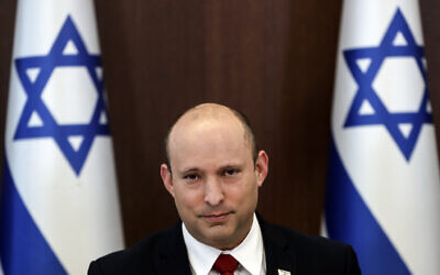 Prime Minister Naftali Bennett chairs the weekly cabinet meeting, in Jerusalem, July 11, 2021. (Ronen Zvulun/Pool via AP)
