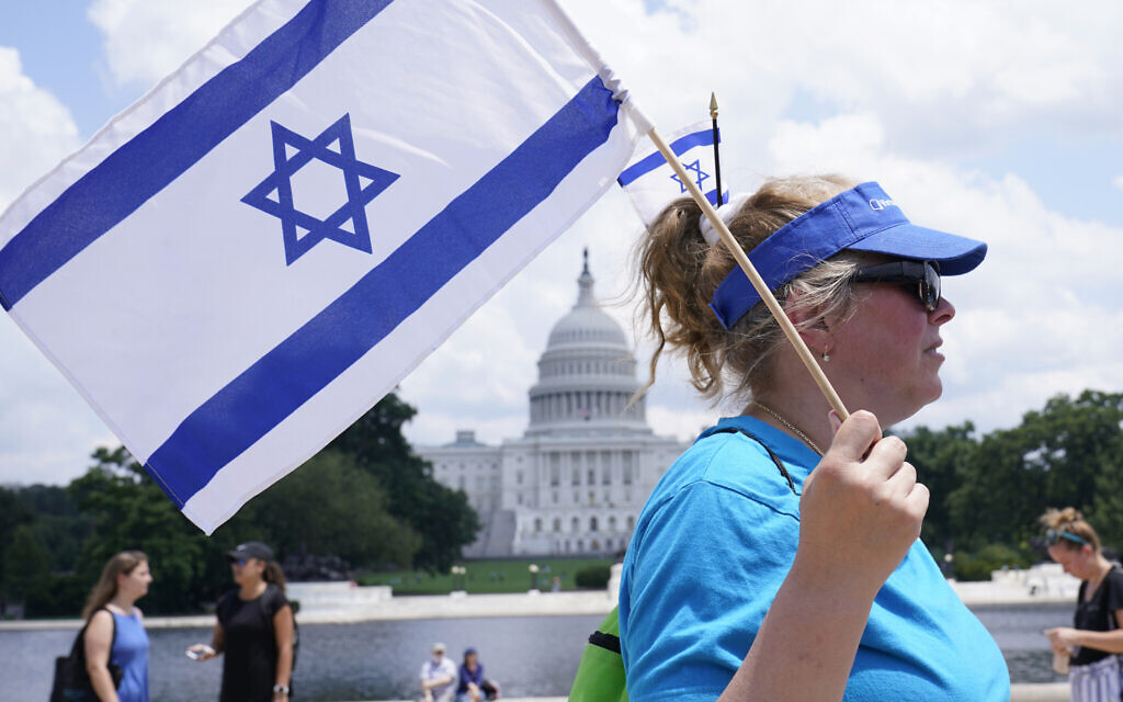 A woman attends the 'NO FEAR: Rally in Solidarity with the Jewish People' event at Capitol Hill in Washington, July 11, 2021. (Susan Walsh/AP) A woman attends the 'NO FEAR: Rally in Solidarity with the Jewish People' event at Capitol Hill in Washington, July 11, 2021. (Susan Walsh/AP)
