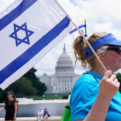 Cara Altman of Livingston, New Jersey, attends the 'NO FEAR: Rally in Solidarity with the Jewish People' event in Washington, Sunday, July 11, 2021, co-sponsored by the Alliance for Israel, Anti-Defamation League, American Jewish Committee, B'nai B'rith International and other organizations. (AP Photo/Susan Walsh)