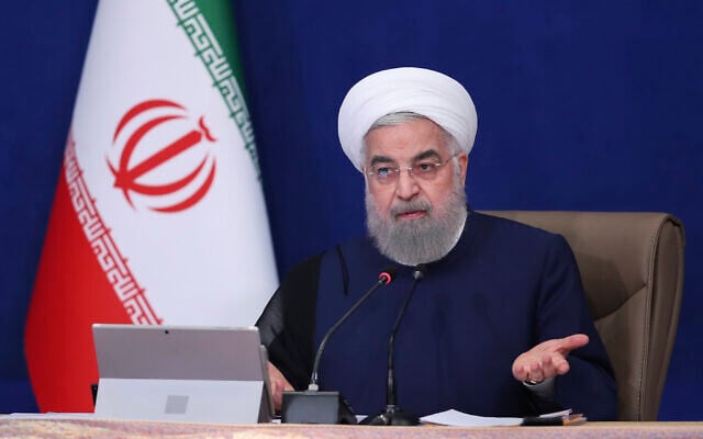 In this photo released by the official website of the office of the Iranian Presidency, President Hassan Rouhani speaks in a cabinet meeting in Tehran, Iran, July 14, 2021. (Iranian Presidency Office via AP)