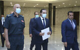Lebanese Prime Minister-Designate Saad Hariri, center, arrives to his meeting with Lebanese President Michel Aoun at the presidential palace, in Baabda, east of Beirut, Lebanon, on July 14, 2021. (Dalati Nohra/Lebanese Official Government via AP)