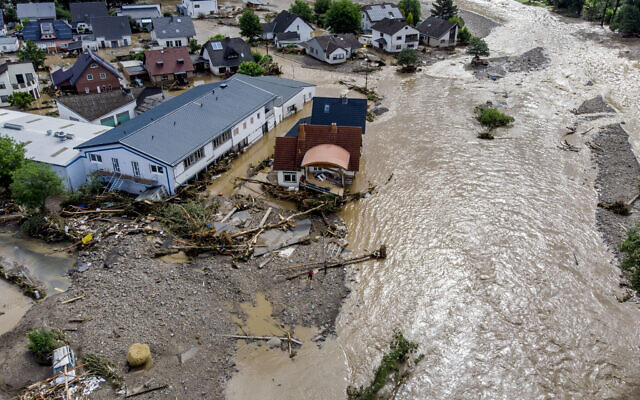 Damaged houses are seen at the Ahr river in Insul, western Germany, Thursday, on July 15, 2021. (AP Photo/Michael Probst) Damaged houses are seen at the Ahr river in Insul, western Germany, Thursday, on July 15, 2021. (AP Photo/Michael Probst)