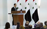In this photo released by the official Facebook page of the Syrian Presidency, Syrian President Bashar Assad takes the oath of office for a fourth seven-year term, at the Syrian Presidential Palace in the capital Damascus, Syria, July 17, 2021 (Syrian Presidency via Facebook via AP)