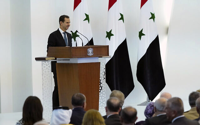 In this photo released by the official Facebook page of the Syrian Presidency, Syrian President Bashar Assad takes the oath of office for a fourth seven-year term, at the Syrian Presidential Palace in the capital Damascus, Syria, July 17, 2021 (Syrian Presidency via Facebook via AP) In this photo released by the official Facebook page of the Syrian Presidency, Syrian President Bashar Assad takes the oath of office for a fourth seven-year term, at the Syrian Presidential Palace in the capital Damascus, Syria, July 17, 2021 (Syrian Presidency via Facebook via AP)