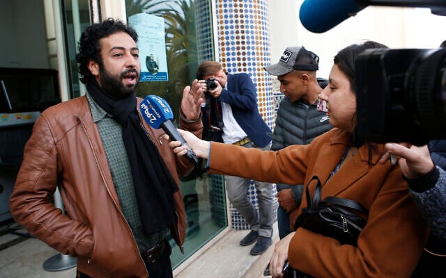 Journalist and activist Omar Radi speaks after a hearing at the Casablanca Courthouse, in Casablanca, Morocco, March 5, 2020. (AP Photo/Abdeljalil Bounhar, File) Journalist and activist Omar Radi speaks after a hearing at the Casablanca Courthouse, in Casablanca, Morocco, March 5, 2020. (AP Photo/Abdeljalil Bounhar, File)