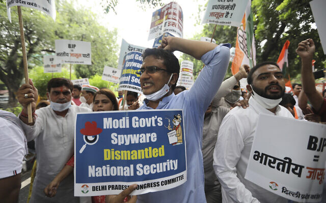 Congress party workers shout slogans during a protest accusing Prime Minister Narendra Modi’s government of using military-grade spyware to monitor political opponents, journalists and activists in New Delhi, India, on July 20, 2021. (AP Photo/Manish Swarup) Congress party workers shout slogans during a protest accusing Prime Minister Narendra Modi’s government of using military-grade spyware to monitor political opponents, journalists and activists in New Delhi, India, on July 20, 2021. (AP Photo/Manish Swarup)