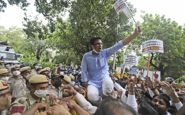 Congress party workers shout slogans during a protest accusing Prime Minister Narendra Modi’s government of using military-grade spyware to monitor political opponents, journalists and activists in New Delhi, India, Tuesday, July 20, 2021. (AP/Manish Swarup) Congress party workers shout slogans during a protest accusing Prime Minister Narendra Modi’s government of using military-grade spyware to monitor political opponents, journalists and activists in New Delhi, India, Tuesday, July 20, 2021. (AP/Manish Swarup)