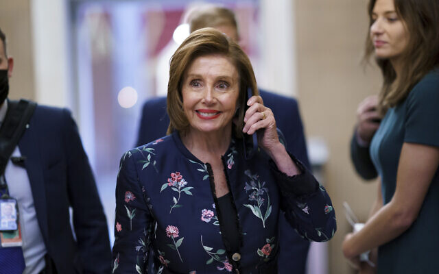 Speaker of the House Nancy Pelosi, D-Calif., returns to her office where members of the House select committee on the January 6th attack on the Capitol are preparing for the start of hearings next week, at the Capitol in Washington, Thursday, July 22, 2021. (AP Photo/J. Scott Applewhite) Speaker of the House Nancy Pelosi, D-Calif., returns to her office where members of the House select committee on the January 6th attack on the Capitol are preparing for the start of hearings next week, at the Capitol in Washington, Thursday, July 22, 2021. (AP Photo/J. Scott Applewhite)