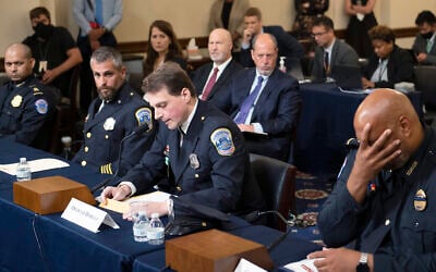 US Capitol Police Sgt. Aquilino Gonell, from left, Washington Metropolitan Police Department officer Michael Fanone, Washington Metropolitan Police Department officer Daniel Hodges and US Capitol Police Sgt. Harry Dunn testify before the House select committee hearing on the Jan. 6 attack on Capitol Hill in Washington, on Tuesday, July 27, 2021. (AP/Brendan Smialowski)