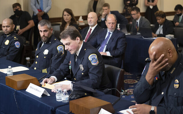 US Capitol Police Sgt. Aquilino Gonell, from left, Washington Metropolitan Police Department officer Michael Fanone, Washington Metropolitan Police Department officer Daniel Hodges and US Capitol Police Sgt. Harry Dunn testify before the House select committee hearing on the Jan. 6 attack on Capitol Hill in Washington, on Tuesday, July 27, 2021. (AP/Brendan Smialowski) US Capitol Police Sgt. Aquilino Gonell, from left, Washington Metropolitan Police Department officer Michael Fanone, Washington Metropolitan Police Department officer Daniel Hodges and US Capitol Police Sgt. Harry Dunn testify before the House select committee hearing on the Jan. 6 attack on Capitol Hill in Washington, on Tuesday, July 27, 2021. (AP/Brendan Smialowski)
