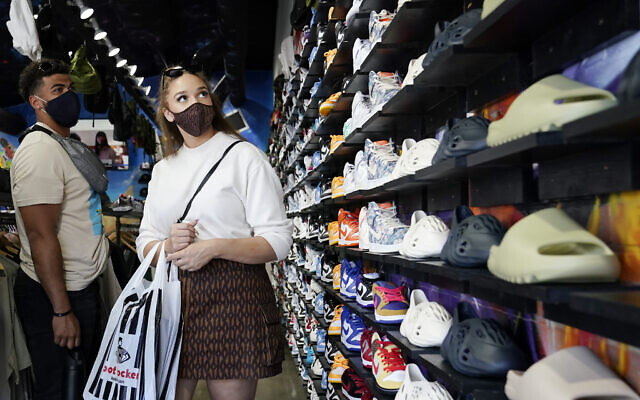 In this July 19, 2021, file photo, shoppers wear masks inside of The Cool store in the Fairfax district of Los Angeles. (AP Photo/Marcio Jose Sanchez) In this July 19, 2021, file photo, shoppers wear masks inside of The Cool store in the Fairfax district of Los Angeles. (AP Photo/Marcio Jose Sanchez)