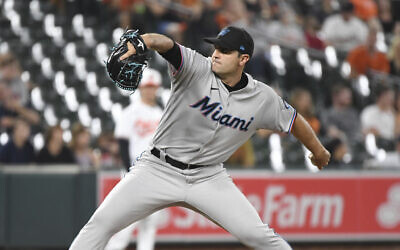 Miami Marlins relief pitcher Richard Bleier throws a pitch during the eighth inning of a baseball game against the Baltimore Orioles Wednesday, on July 28, 2021, in Baltimore. (AP Photo/Terrance Williams)