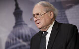 Then-Senator Carl Levin of Michigan attends a news conference at the Capitol in Washington,  December 4, 2014. (AP Photo/J. Scott Applewhite, File)