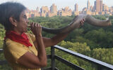 Since the early days of the pandemic, Rabbi Janise Poticha has kept up her shofar-blowing at 7 p.m. daily as a salute to health care workers. (Lydia Orias/via JTA)