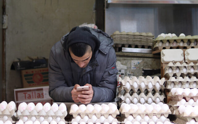 A man selling eggs at an eggstand in the Machane Yehuda Market, in Jerusalem, January 27, 2018. (Liba Farkash/ Flash 90) A man selling eggs at an eggstand in the Machane Yehuda Market, in Jerusalem, January 27, 2018. (Liba Farkash/ Flash 90)