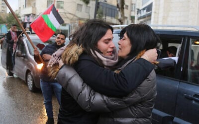 Suha Jarrar (L) greets her mother Khalida Jarrar of the Popular Front for the Liberation of Palestine (PFLP) after she was released from 20 months of detention in the West Bank city of Ramallah on February 28, 2019 (STR/Flash90)