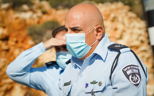 Moshe Barkat, then commander of the police Judea and Samaria district, visits a temporary roadblock in the Sha'ar Binyamin industrial zone in the West Bank, January 10, 2021. (Hillel Meir/Flash90) Moshe Barkat, then commander of the police Judea and Samaria district, visits a temporary roadblock in the Sha'ar Binyamin industrial zone in the West Bank, January 10, 2021. (Hillel Meir/Flash90)